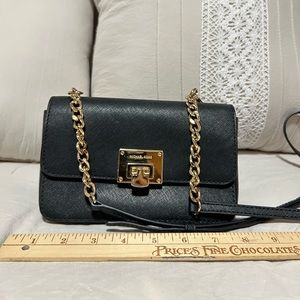 Michael Kors Gold and Black wallet clutch purse, in great condition